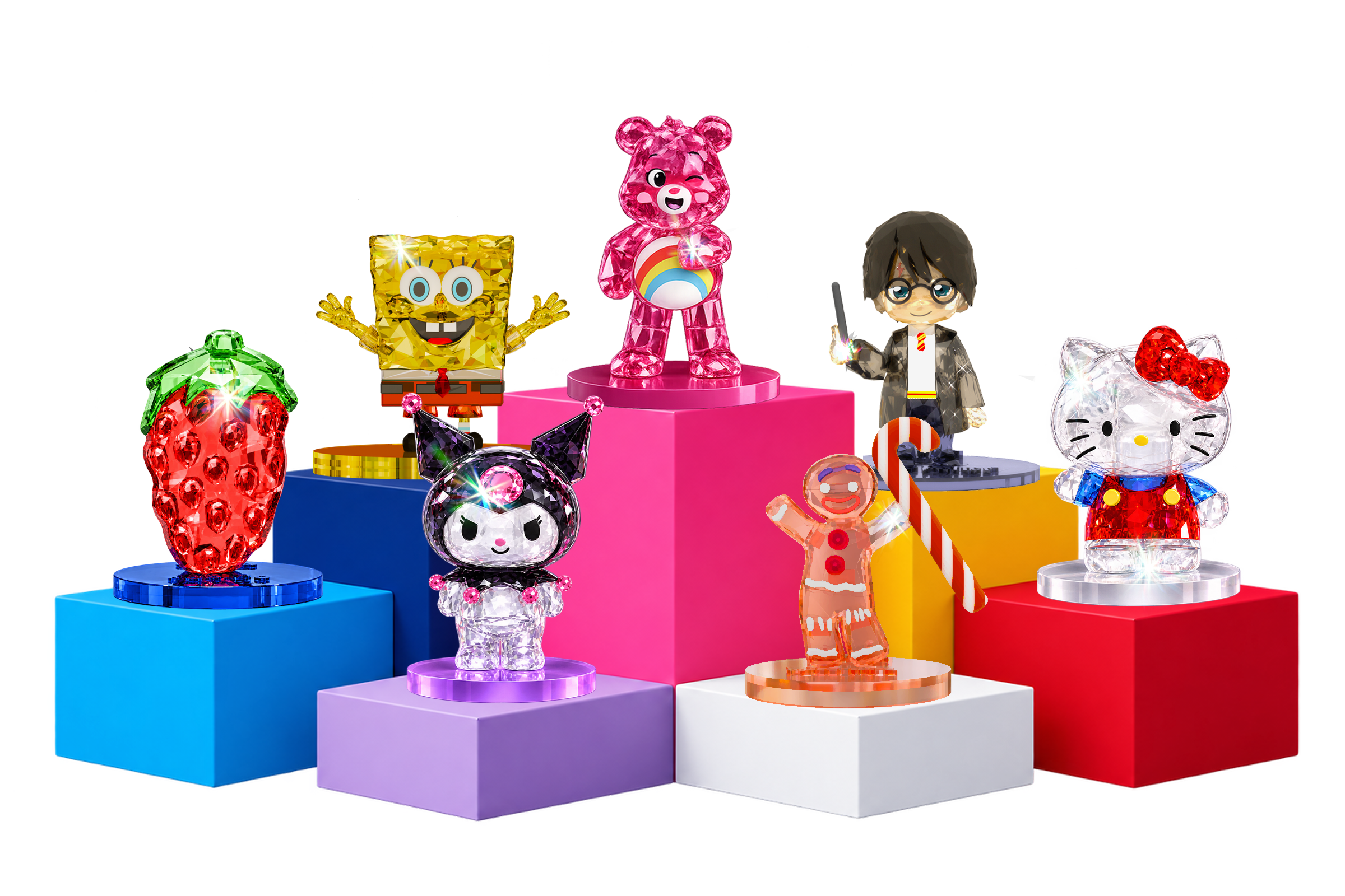 Three sparkling Care Bears Bling Buddies figures on matching coloured display bases